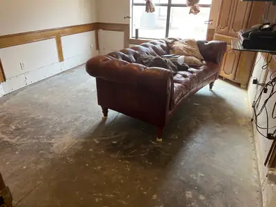 Living room with flooring removed