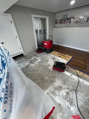 Room sealed with protective sheeting